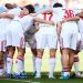 Jugadores del Sevilla dándose ánimos antes del partido ante el Osasuna. | Imagen: perfil de X @SevillaFC.